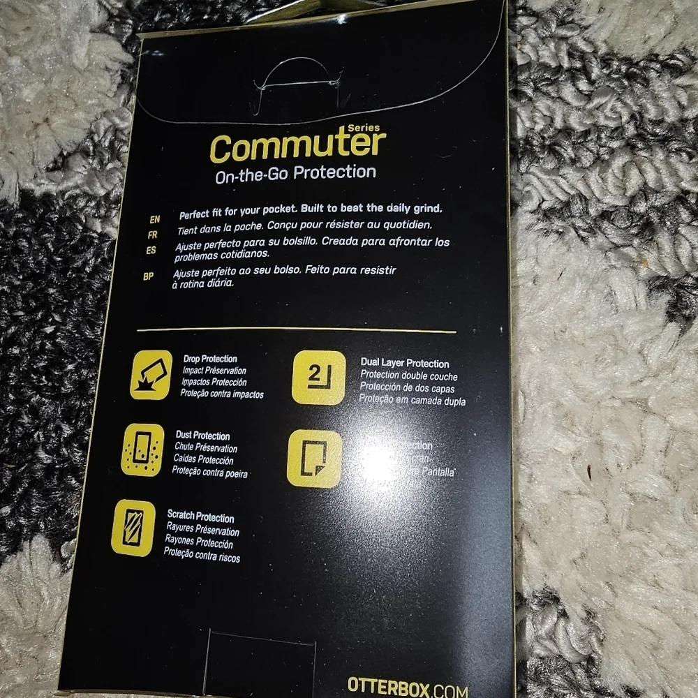New in box iPhone 7 otter box commuter series phone protector.